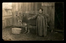 Real Photo Postcard RPPC Woman w/ Cow Barnyard AZO Stamp Box Antique