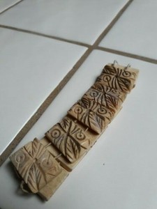 vintage-carved-bracelet-needs-to-be-repaired-with-proper-threat