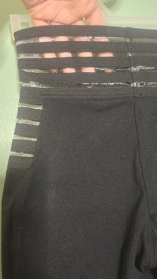 Bombshell Sportswear leggings XS, black with transparent stripes in good condit.