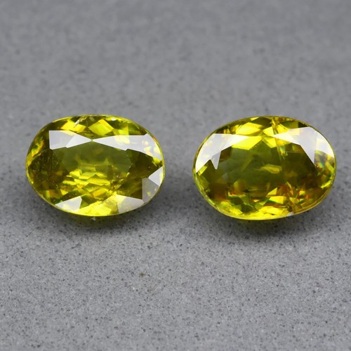 π 1.76ct 2pcs Pair VS Oval Natural Yellowish Green Sphene - High Luster, Gems - Picture 2 of 5