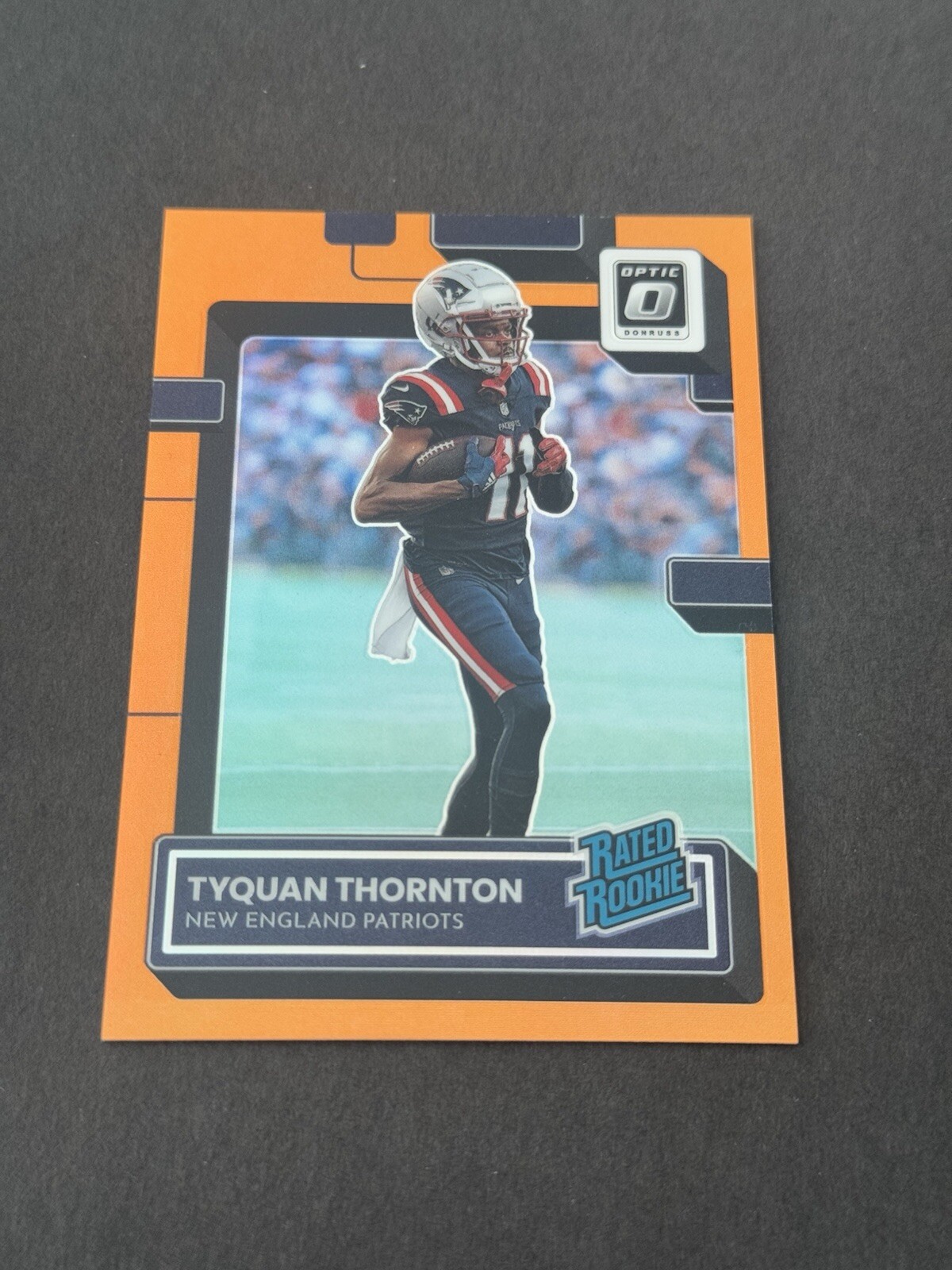 2022 Panini Donruss Optic Orange Tyquan Thornton 121/199 #222 Patriots