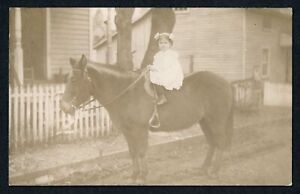 1910-RPPC-Adorable-Little-Girl-Seated-on-Horse