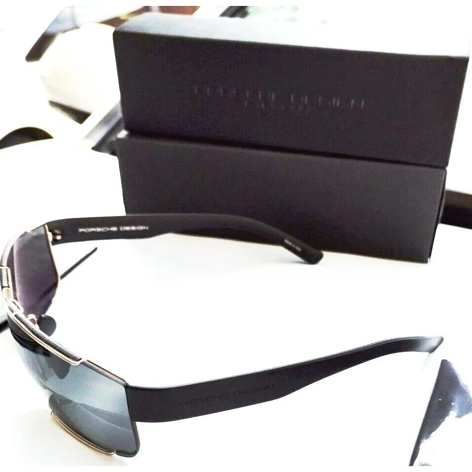 Gafas de sol Porsche design p8509 B brazo negro marco dorado lentes grises hechas en Italia Foto 3 de 4