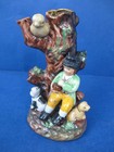 Vintage Staffordshire ceramic spill vase. Boy with two dogs and a bird.