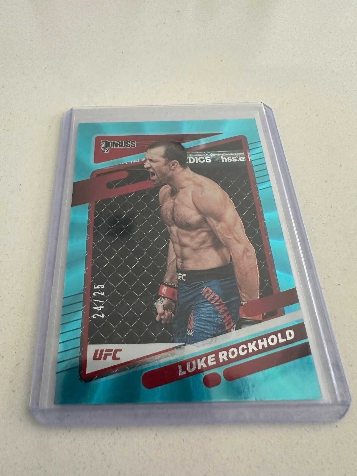 2022 Donruss UFC Luke Rockhold Holo Teal Laser 24/25 #102