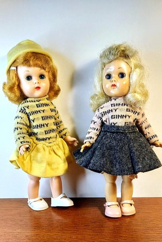 Two vintage Vogue BKW Ginny dolls in tagged Jersey knit tops, skirt and skort
