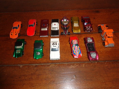 12 older Hot Wheels and 1 Johnny Lightning car