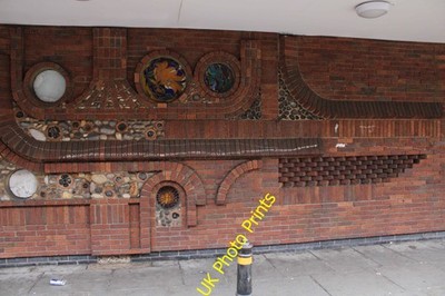 Photo A3 View of artistic brickwork on the rear of Sainsbury's on Dog's  c2021
