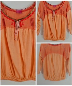 orange peasant blouse