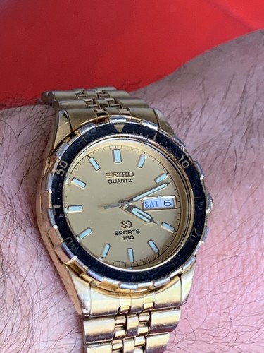 Seiko Sports 150m Quartz Day-Date Diver Gold-Dial Black Bazel Men's Watch - Picture 3 of 12