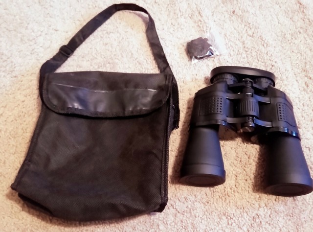Y & Y Binochulars - 20x50 Super Vision - 3 lens protctrs strap & carrying case. Y & Y Binochulars - 20x50 Super Vision - 3 lens protctrs strap & carrying case.