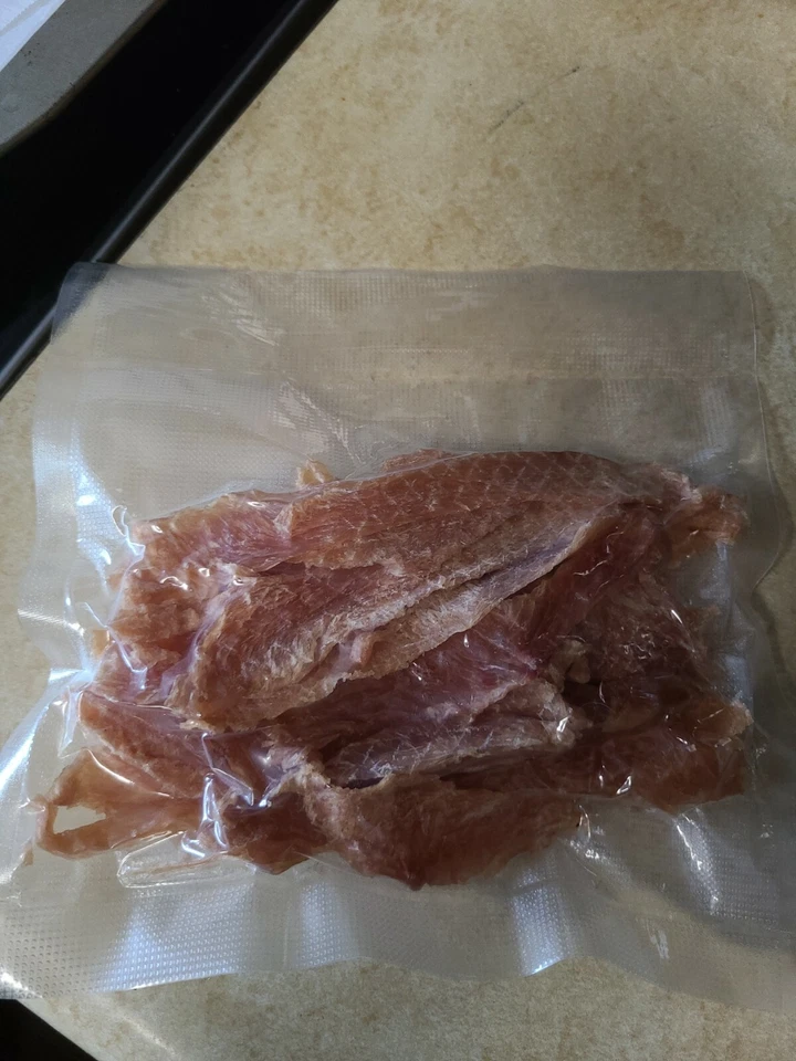 Golosinas de pollo cecina para perros hechas en EE. UU. 100 % pechuga de pollo nada más Foto 2 de 2