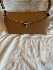 Toteme t lock clutch bag (Small) in Tan Madi In Italy