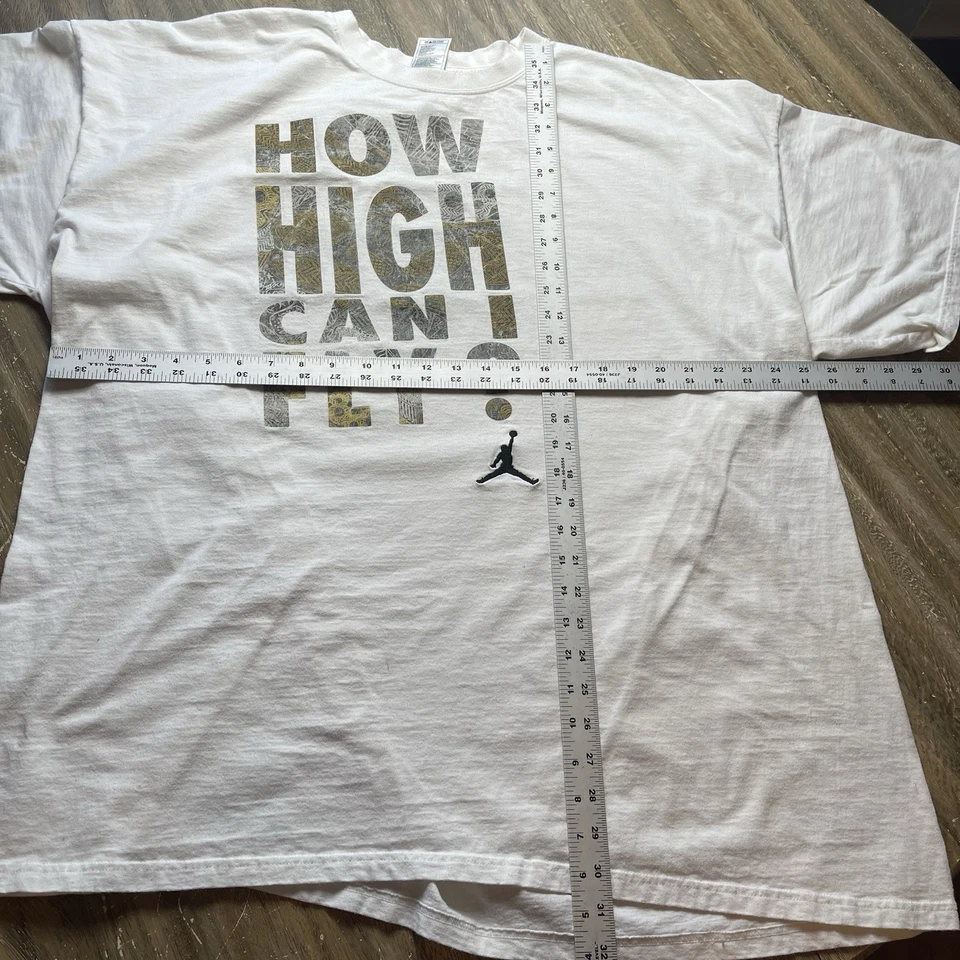 Camiseta blanca vintage Air Jordan para hombre con logotipo de Jumpman How High Can You Fly 4XL Foto 3 de 4