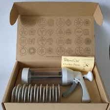 The Pampered Chef Cookie Press- 1525 with 16 Discs, complete in original box