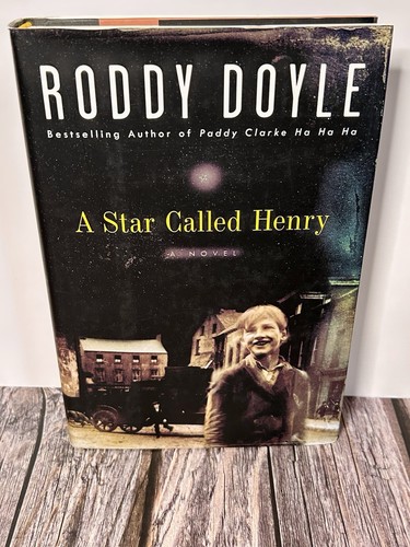 A STAR CALLED HENRY • RODDY DOYLE • 1ST EDITION, 1ST PRINTING HCDJ / IRISH / NF - Picture 1 of 9