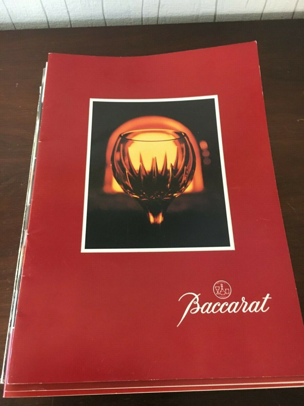 Lot de 12 magazines sur la maison Baccarat Aandelen