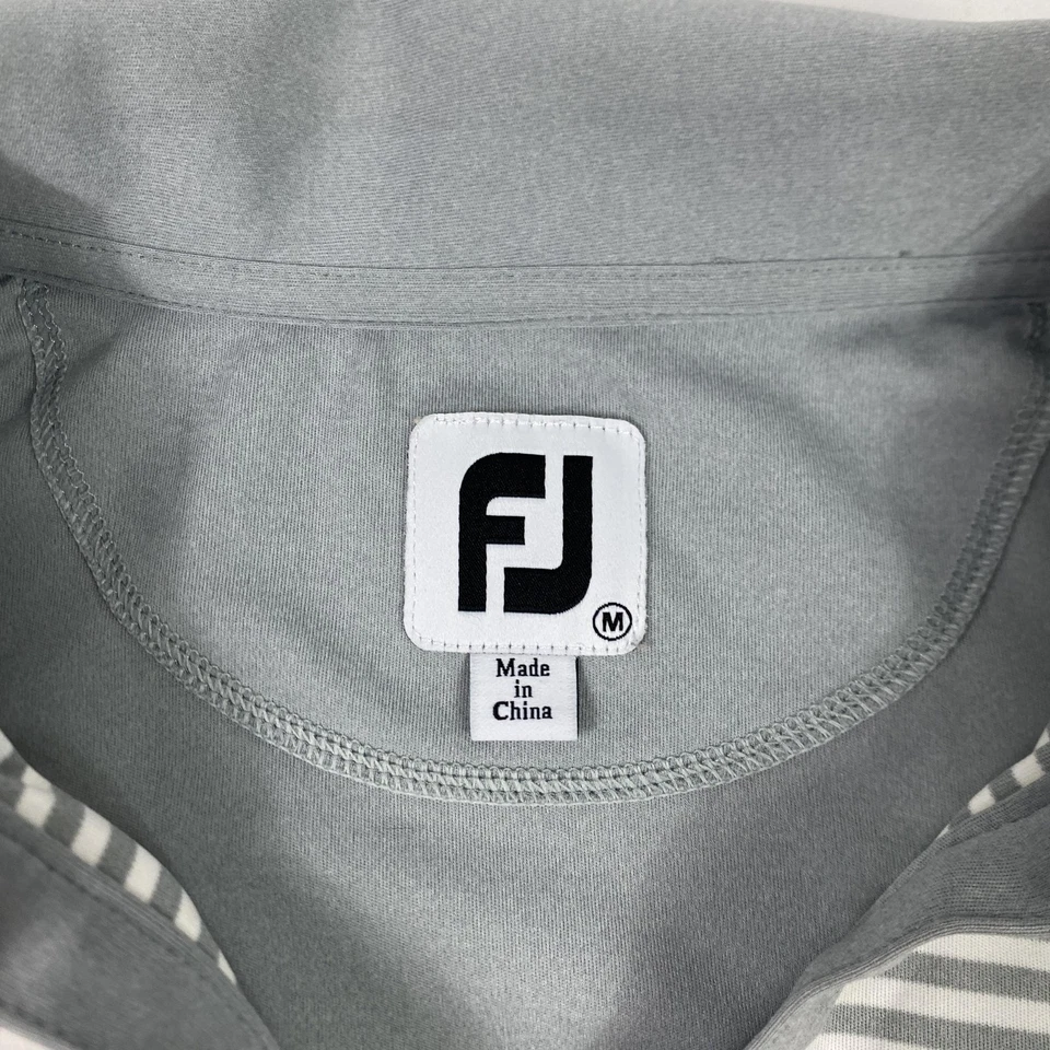 Camisa polo de golf FootJoy para mujer mediana gris blanca a rayas tiburón medio atlética Foto 4 de 4