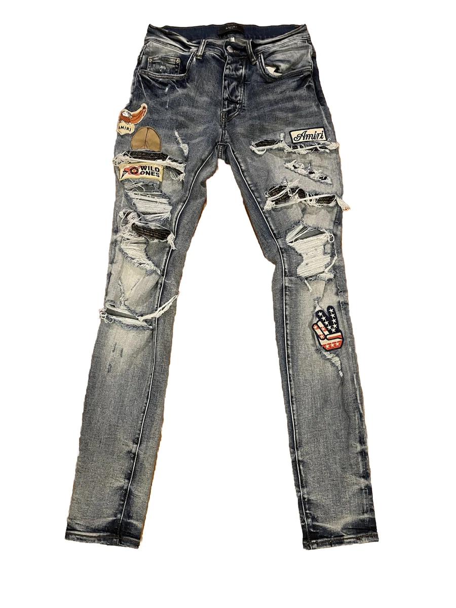 Amiri jeans store with patches