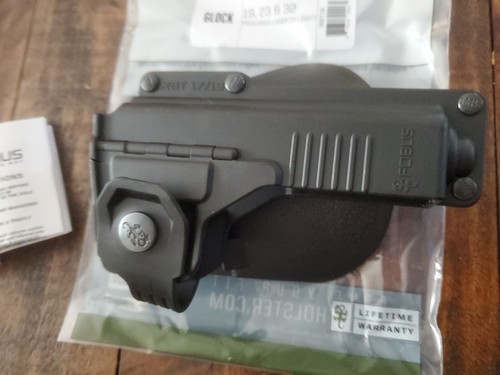 FOBUS RBT19 PADDLE HOLSTER FOR GLOCK 19 23 32 PISTOL WITH LASER OR LIGHT TAURUS - Picture 15 of 24