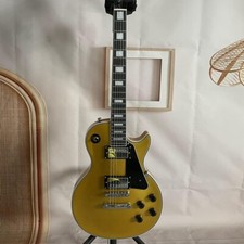 Gold LP Electric Guitar Solid Body Mahogany Body HPL Fretboard Black Pickguard