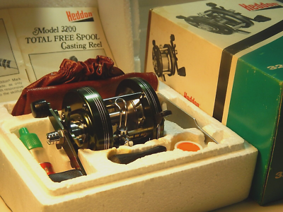 Vintage Heddon 3200 Mark IV teal-green helical-geared