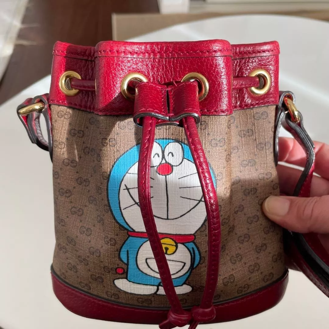 Sac seau à bandoulière Gucci Doraemon Collaboration cordon Gg Supreme 2503M