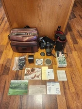 Canon T70 35mm Camera Bundle w/ 3 Lenses, Flash, Bag Paperwork Cleaned & Tested