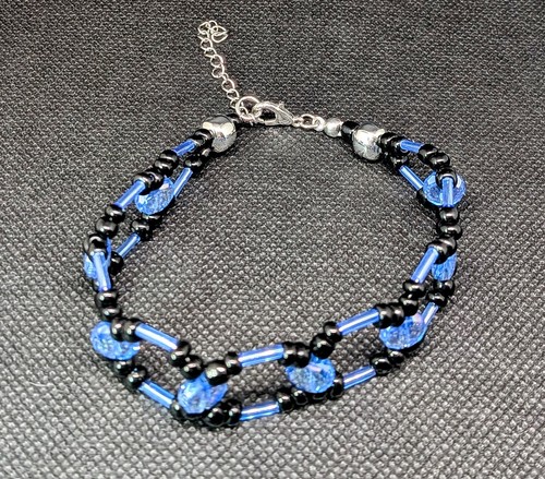 Lebendiges Armband aus facettiertem Kristallglas in Schwarz und Blau Glanz - Bild 9 von 9