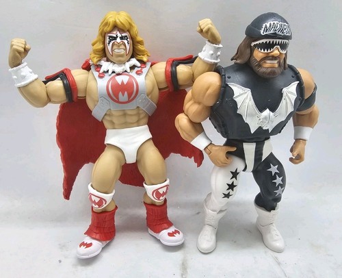 WWE Masters Of The Universe Macho Man Man And Ultimate Warrior - Picture 1 of 2