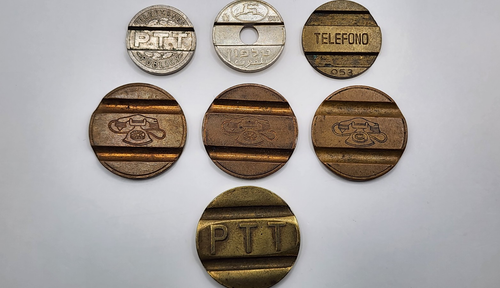 Lot of (7) World Telephone Tokens