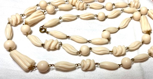 Vintage 42”Celluloid necklace unique four different shape beads carved and round