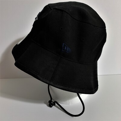 NEW ERA × Ameri LOGO TAPE BUCKET HAT All-Over Patch Bucket Hat by New Era --> Shop Hats, Beanies