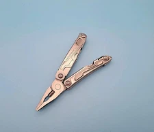 Leatherman Rev Multi-Tool - Pliers, Knife, Screwdrivers, Can Opener, File