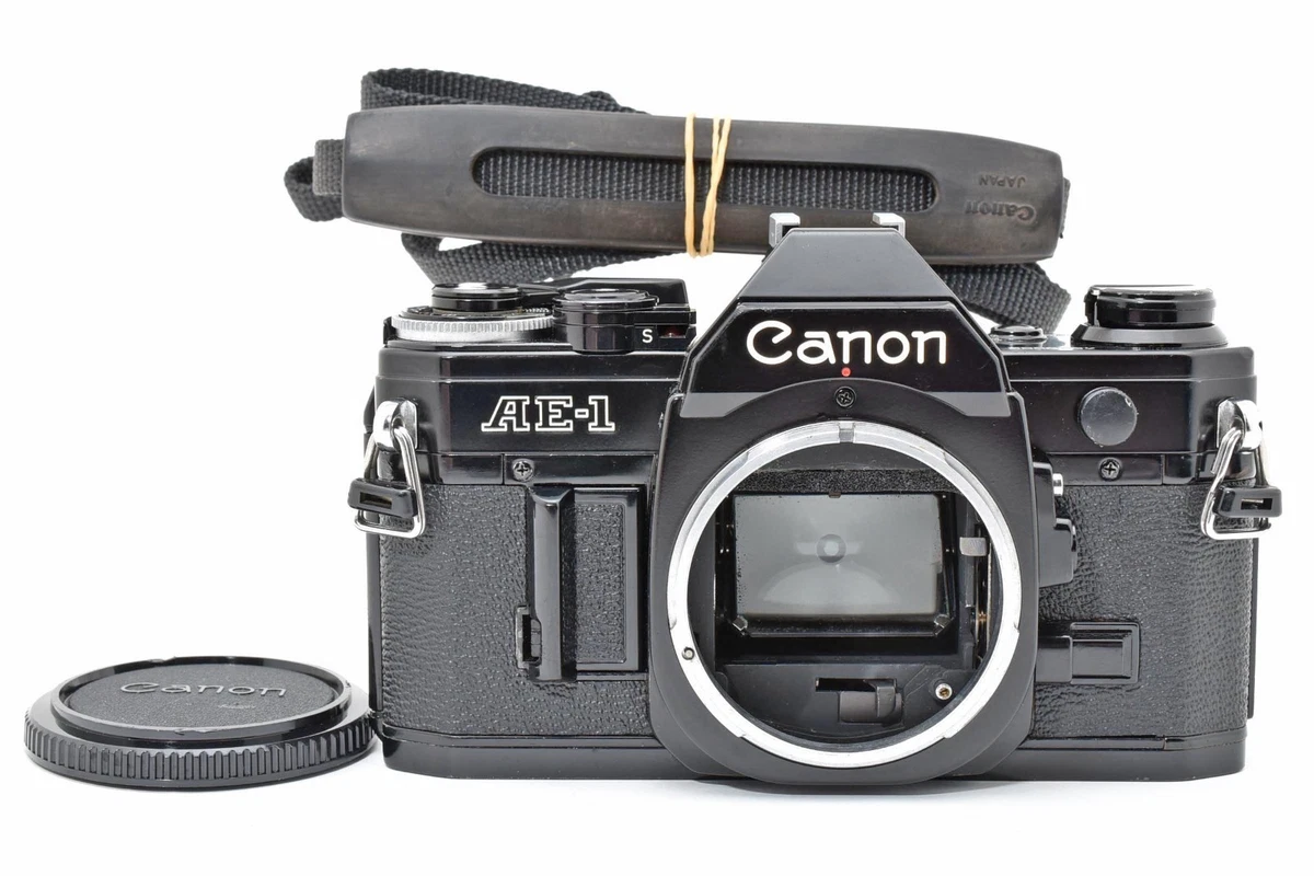 Très bel ensemble appareil photo argentique Canon AE-1 avec objectif 1,8/50mm + flash – mousses neuves – très bon état - Photo, audio & vidéo