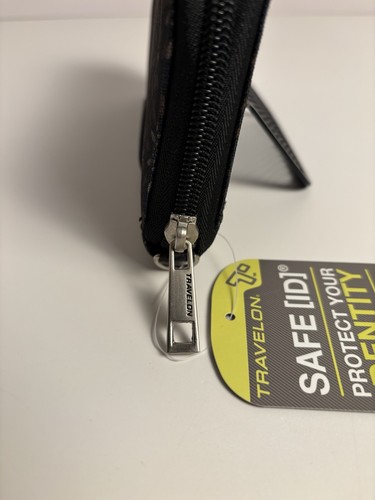 Neu mit Etikett Travelon RFID-Schutz schmale Reißverschluss Geldbörse mit Handschlaufe schwarz mit Design - Bild 4 von 11