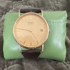 Seiko Quartz Gold Dial Date Vintage Men's 34mm Gold Case Brown Leather Strap