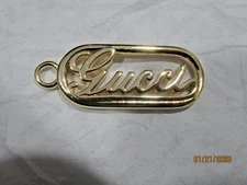 GUCCI   ZIPPER PULL CHARM CLEAN GOLD tone metal , 1 1/4 INCH