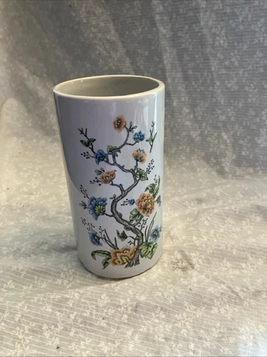 vintage McCoy 677 USA pottery 6 inch. Cylinder vase. Pink and blue flowers on a