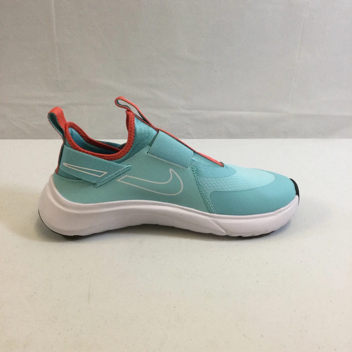 Nike blue slip on best sale sneakers