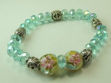 Handcrafted Turquoise Crystal Stretch Bracelet with Floral Lampwork