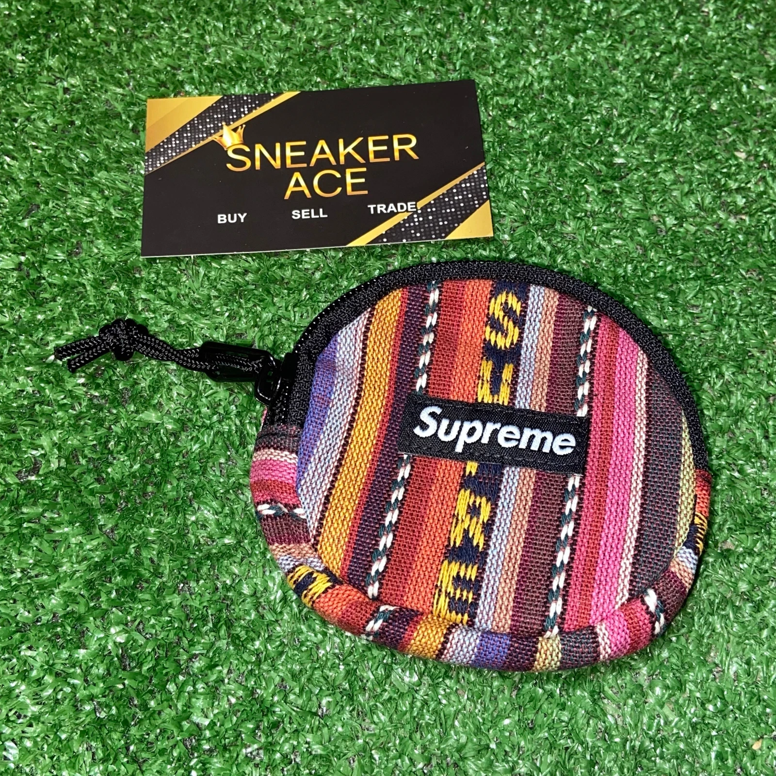 Pochette à monnaie à rayures tissées suprême multicolore