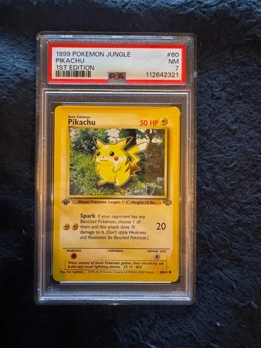 PSA 7 Near Mint Pikachu 1st Edition #60 - 1999 Pokemon Jungle