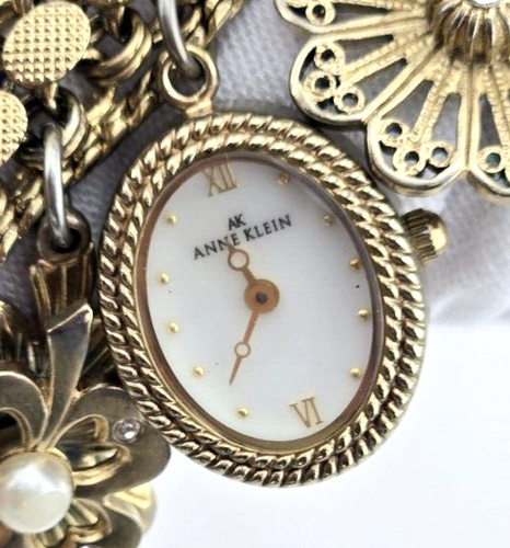 Anne Klein Gold Tone Charm Braclet w 1 Jewel Watch Swiss Parts w Locket NEW BAT - Picture 4 of 11