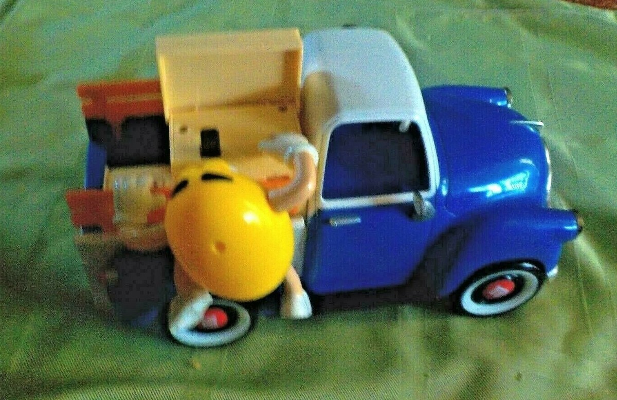 M&M Blue & White old Truck w/Red m&m driving &Yellow one M&M Blue & White old Truck w/Red m&m driving &Yellow one