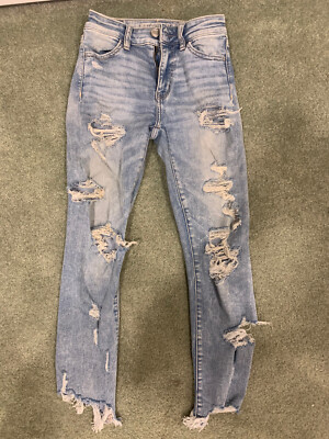 light blue ripped distressed denim skinny jeans american eagle size 4