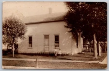 2 Children Pictured in The Front Yard of Their Home RPPC Real Photo Postcard