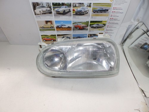 VOLKSWAGEN GOLF GTI. 91/ 97 - FARO SX DOPPIA PARABOLA ORIGINALE HELLA - Bild 1 von 3