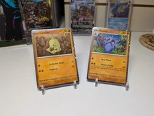 Larvitar 105/197 + Pupitar 106/197 Cosmos Holos Obsidian Flames Pokemon TCG NM