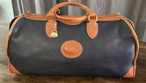 Bolso de Noche de Cuero Dooney & Bourke De Colección Lona 'Todo Clima' Negro Tostado Guijarro - Imagen 2 de 24